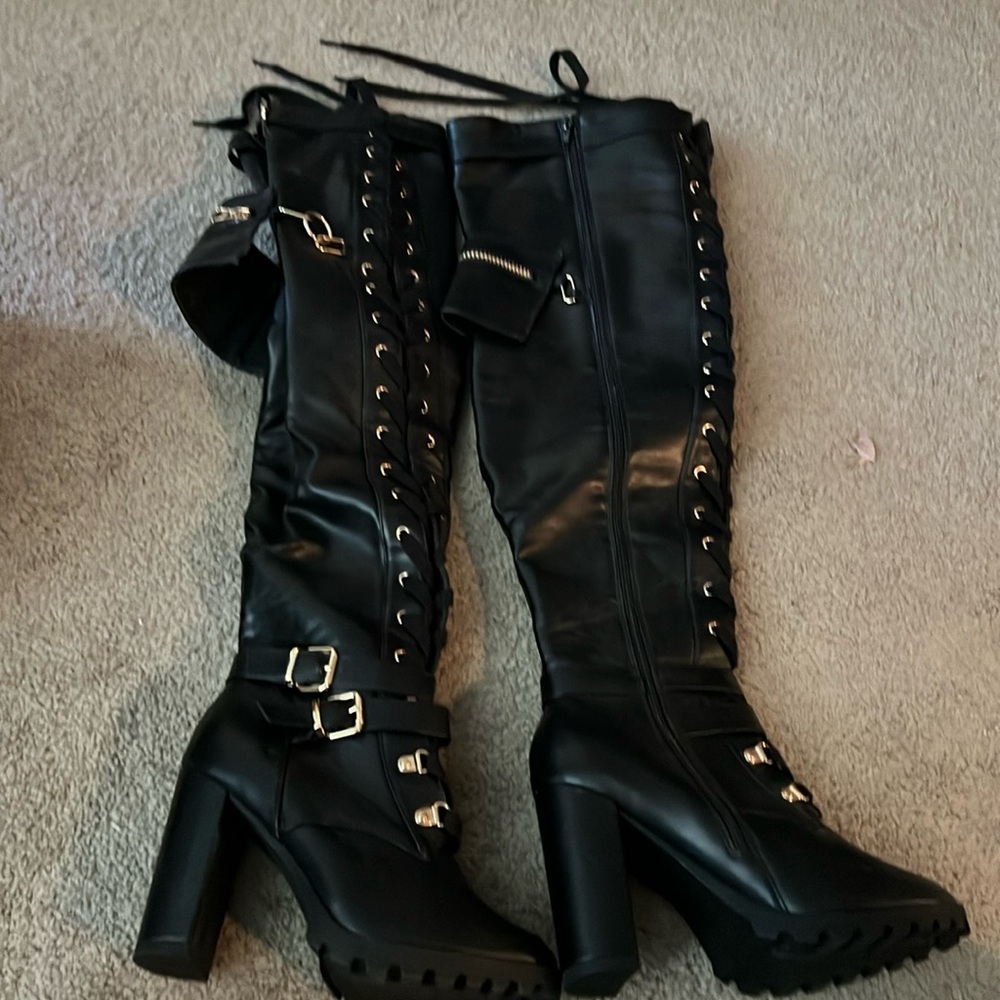 Thigh High Black Boots with Gold details. Size 9 women’s.